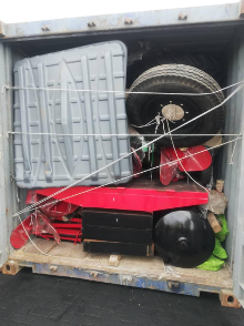 Equipment secured inside a shipping container